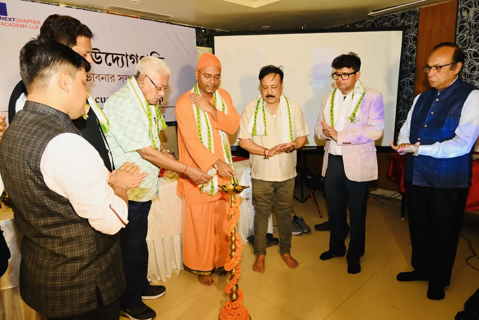Guests lighting the ceremonial lamp to inaugurate the Ami Udyogpati entrepreneurship seminar-cum-workshop in Agartala